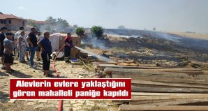 VATANDAŞLAR, EVLERİNİ KORUMAK İÇİN KOVALARLA SU TAŞIDI